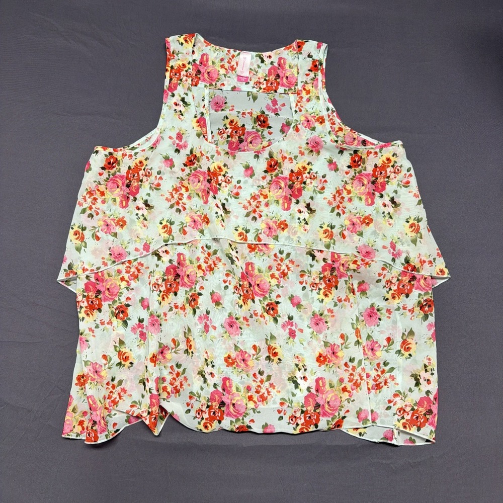 mint green sleeveless tank top features a vibrant pink and red floral print NoBo